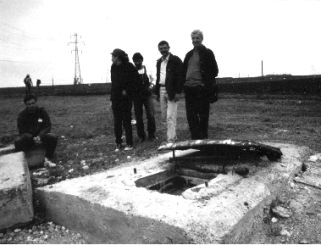 In front of the Movile Cave (southern Dobrogea), 1993.
Standing, from left to right: Dr. P.-M. Samson, Dr. E. Stiuc�,
Prof. Dr. V. Codrea, Dr. C. R�dulescu